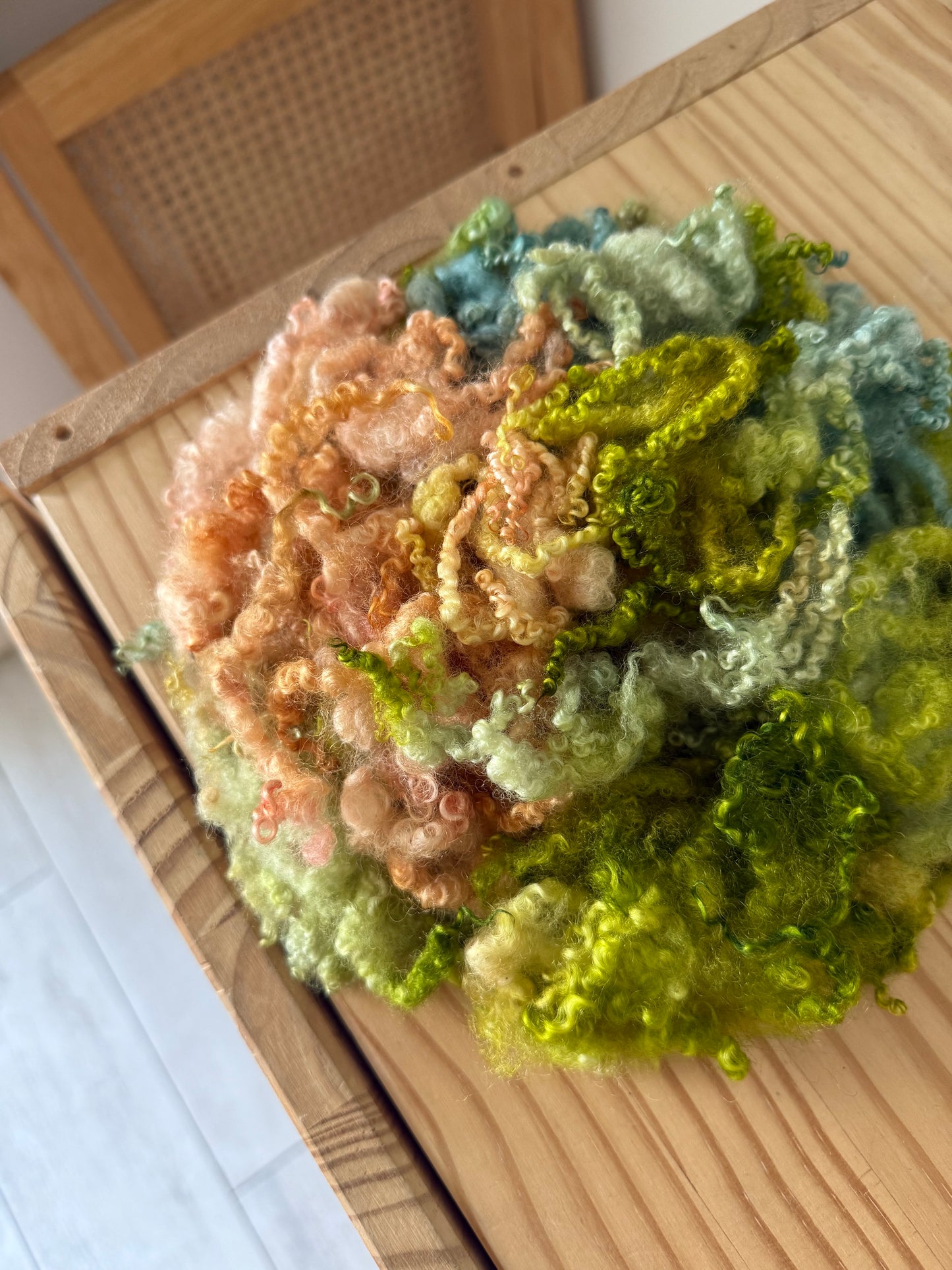 bluefaced leicester locks - peach pistachio marine