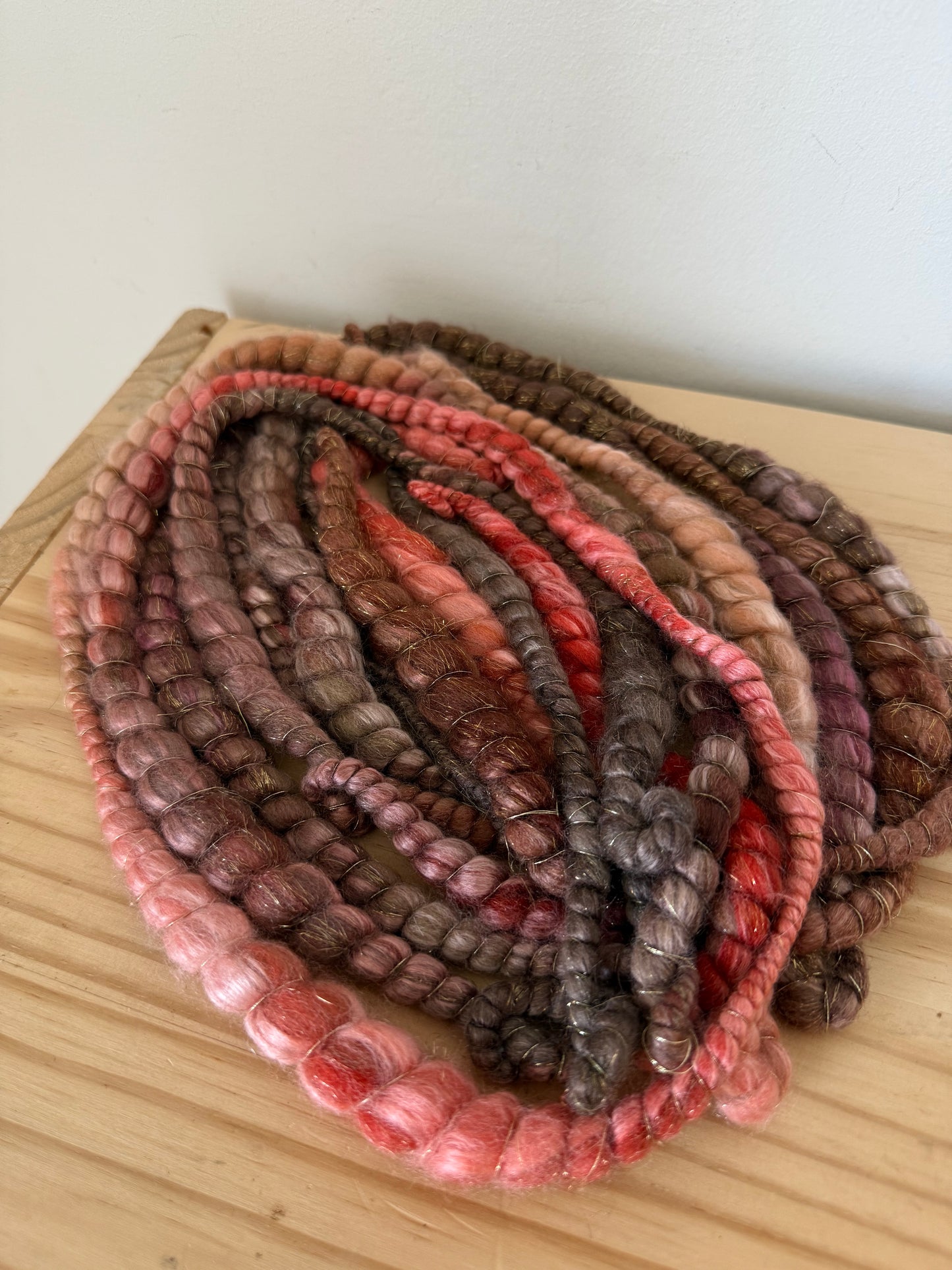 plum magenta & gold spiral art yarn