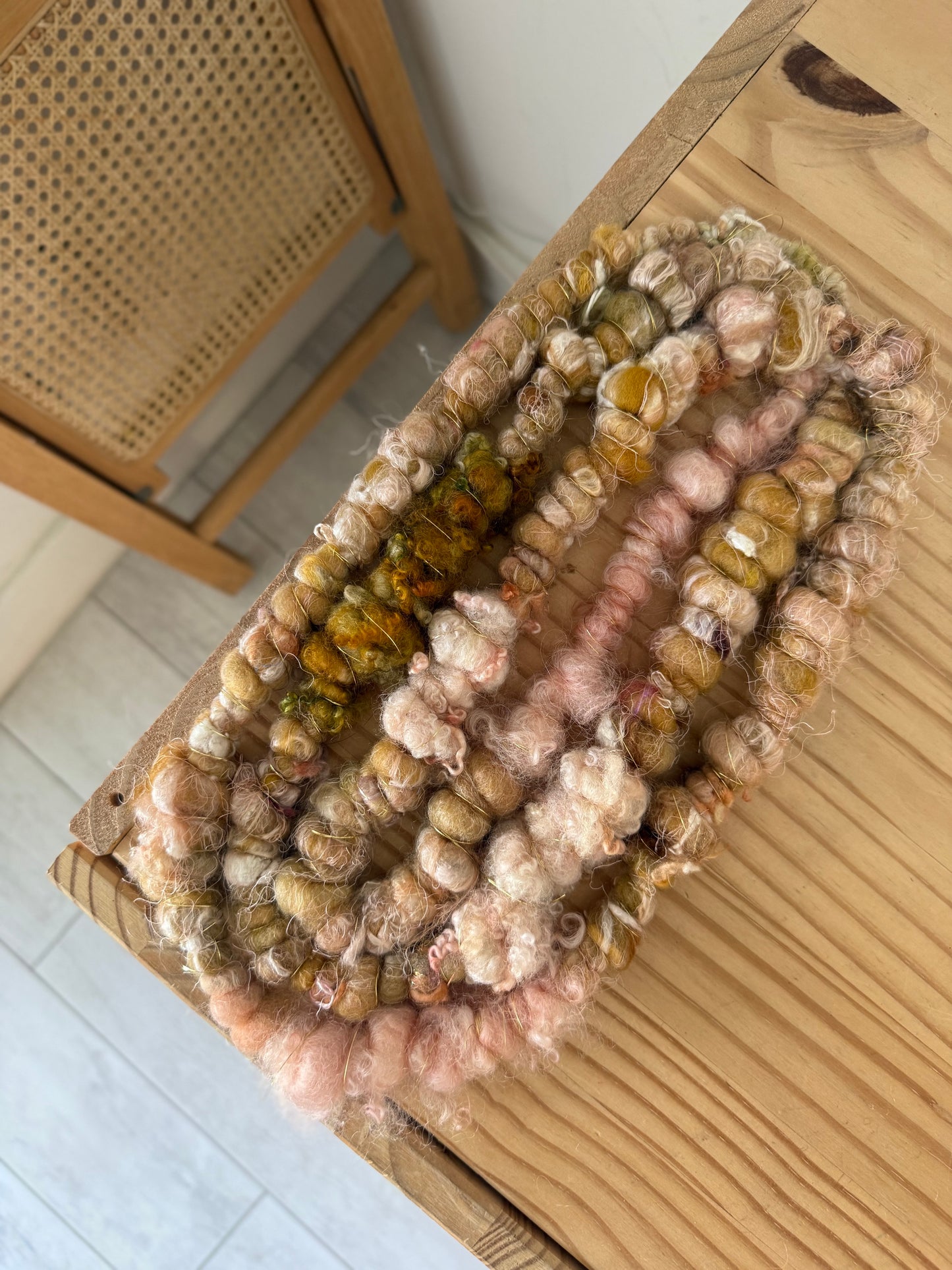 pink & gold textured handspun art yarn