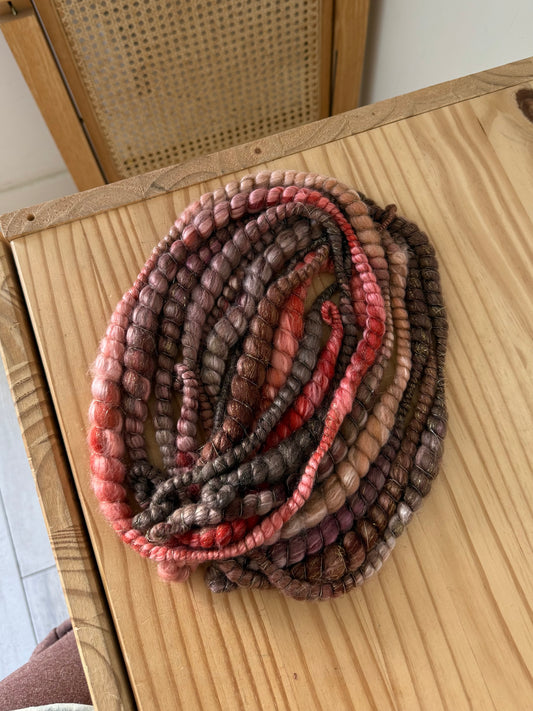 plum magenta & gold spiral art yarn