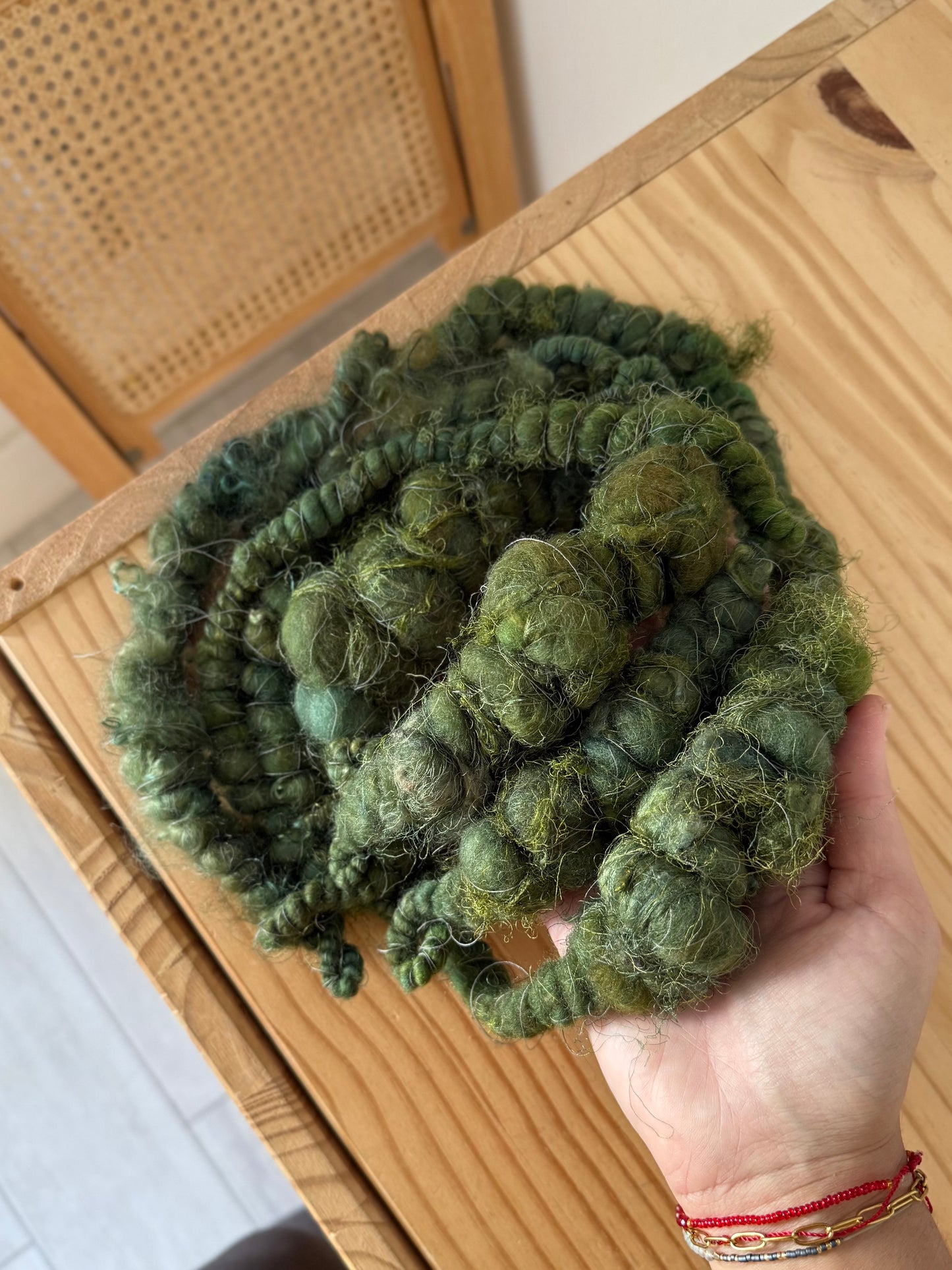 super jumbo coiled art yarn in forest green
