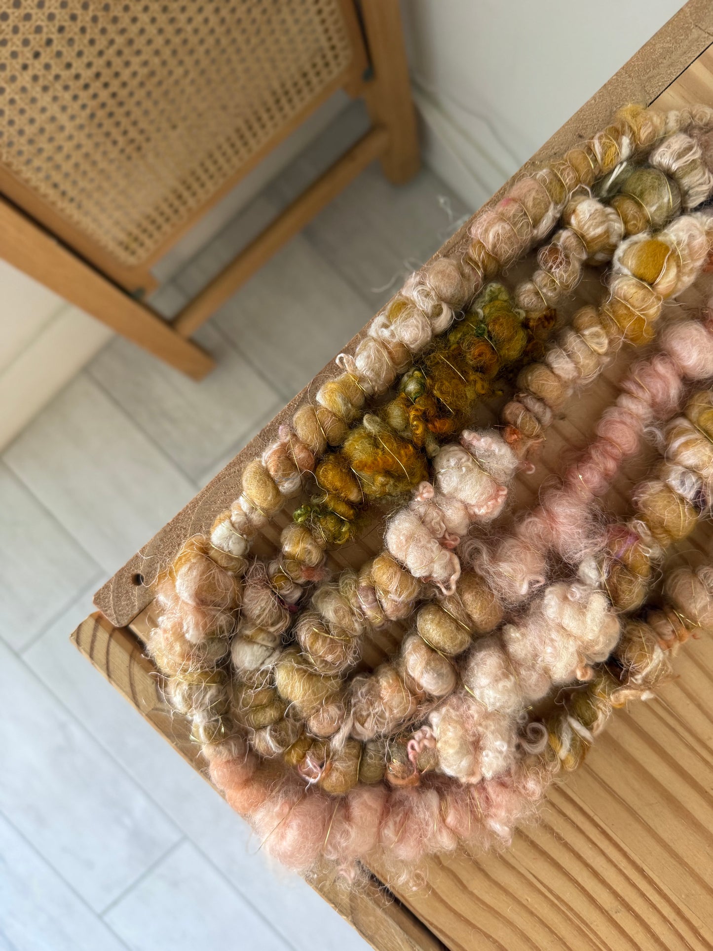 pink & gold textured handspun art yarn
