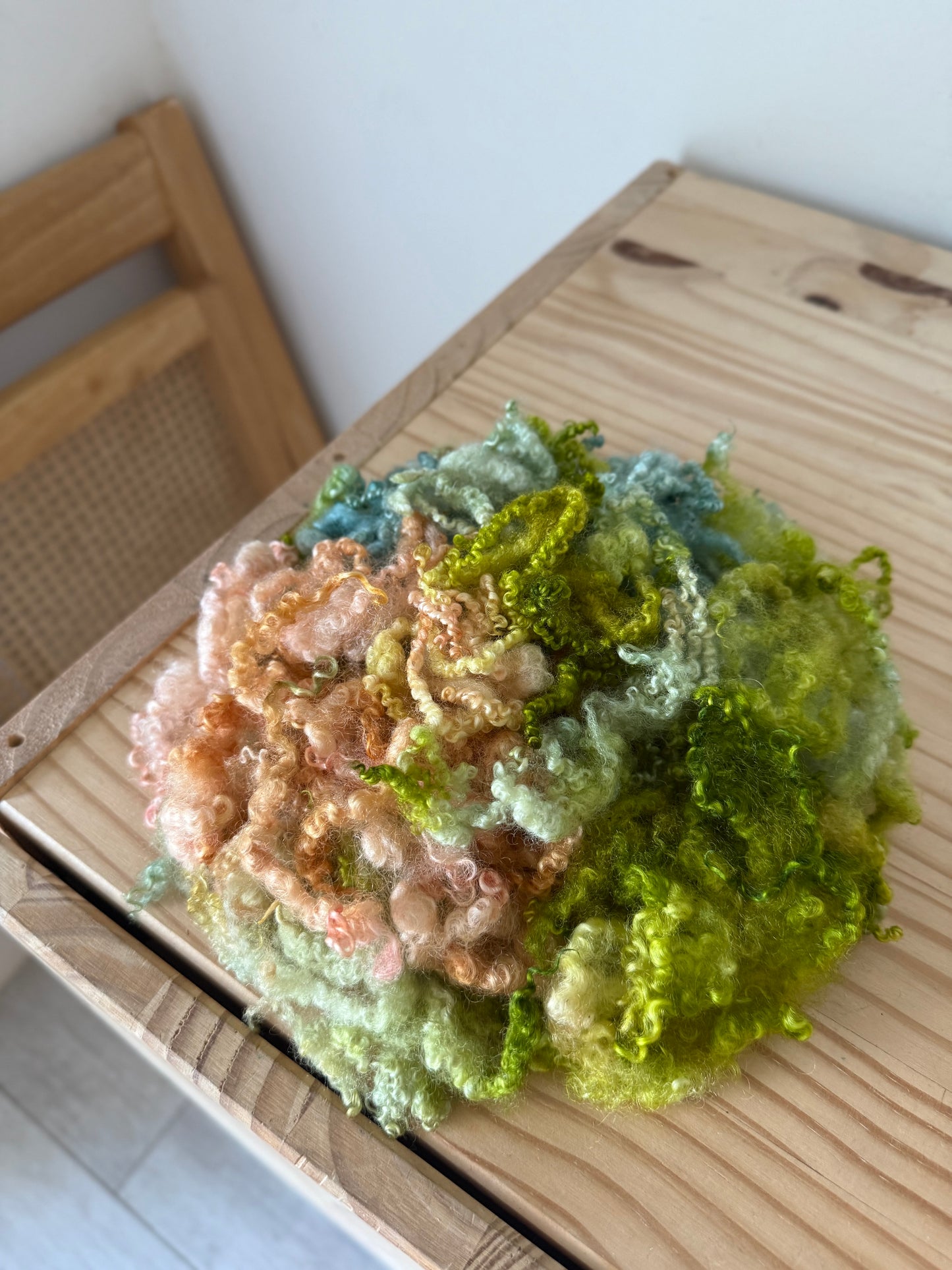 bluefaced leicester locks - peach pistachio marine