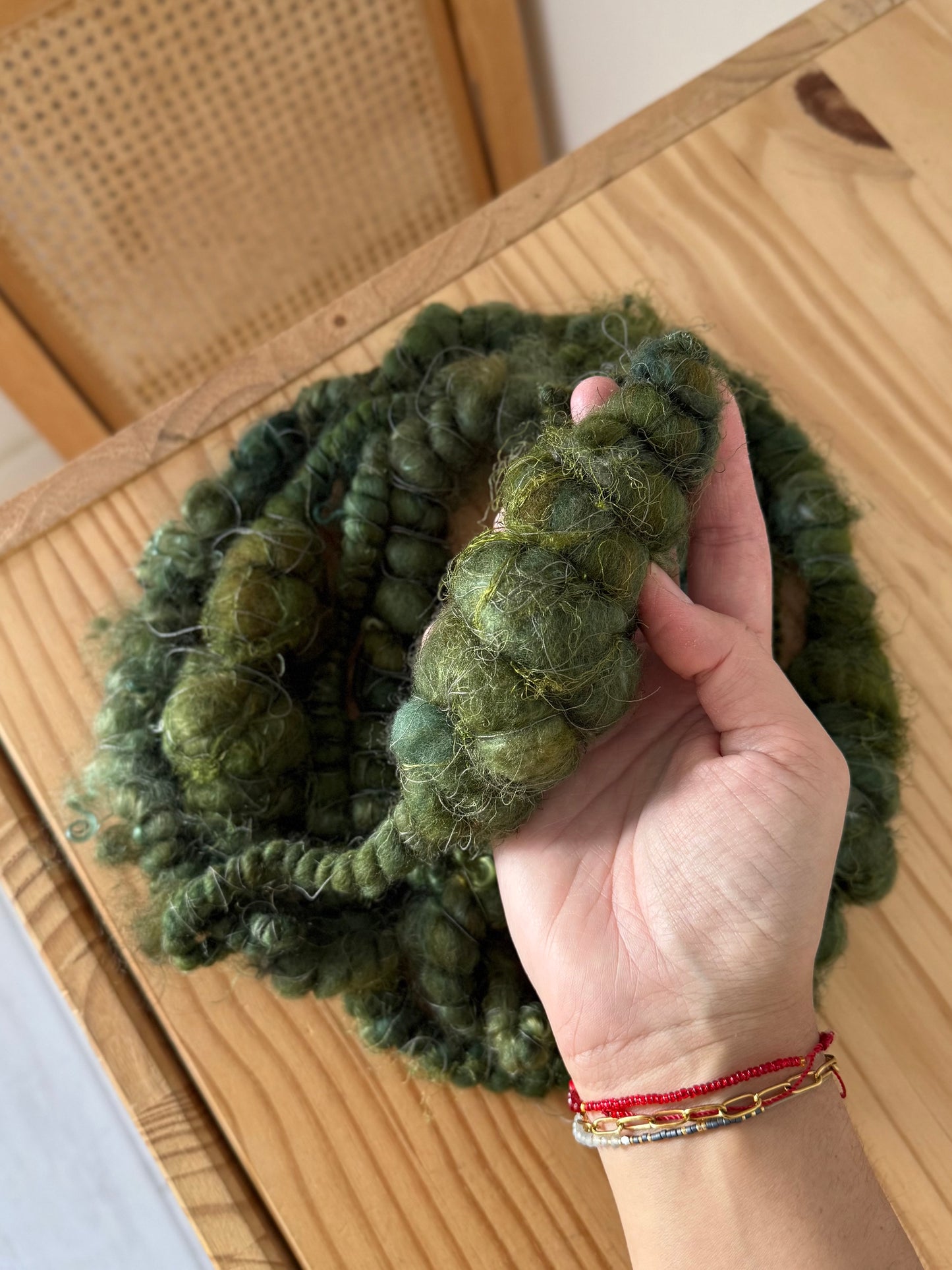 super jumbo coiled art yarn in forest green