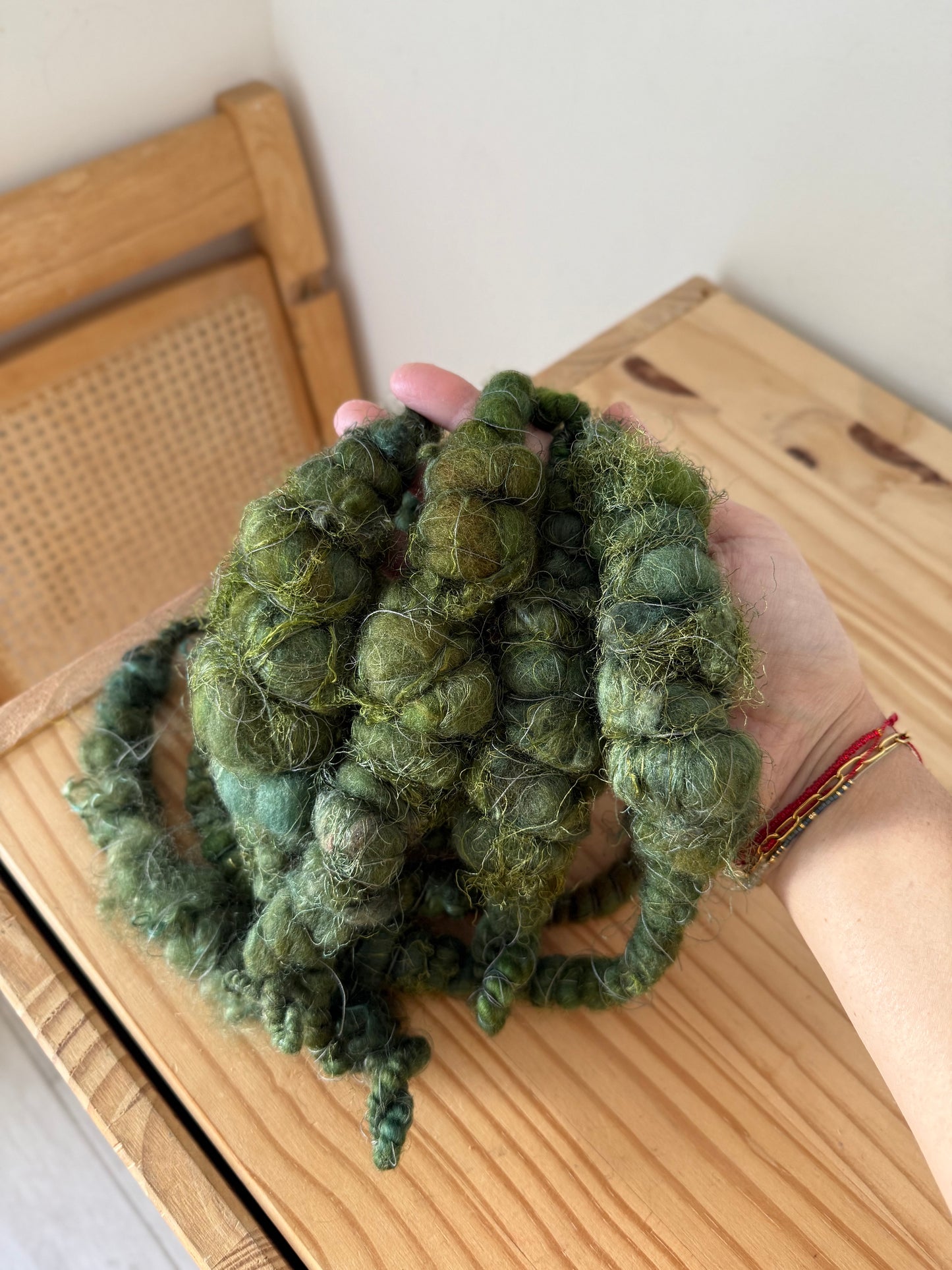 super jumbo coiled art yarn in forest green